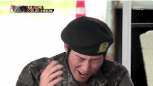 Jang Hyuk laughs at Sooro's bad joke, exaggerating a bit to please his "superior"
